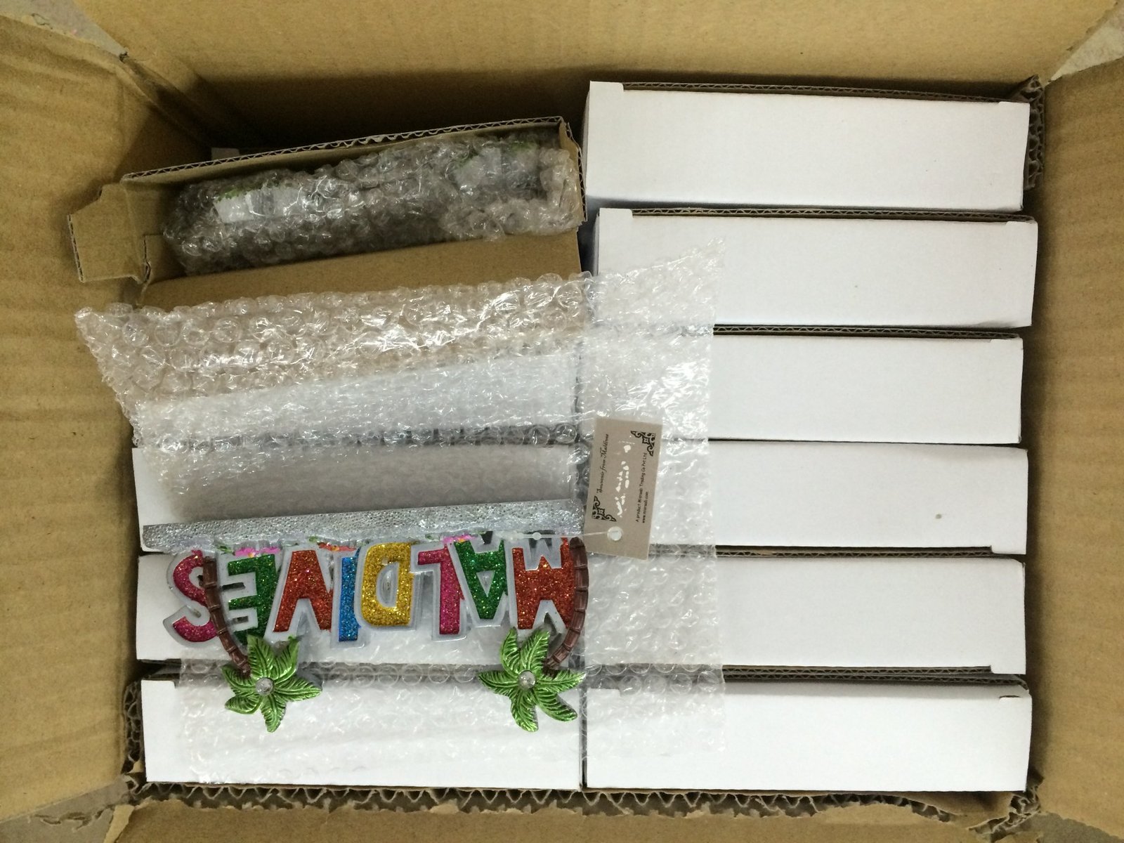 Retail-ready resin bobblehead color box packed 12 to a master carton